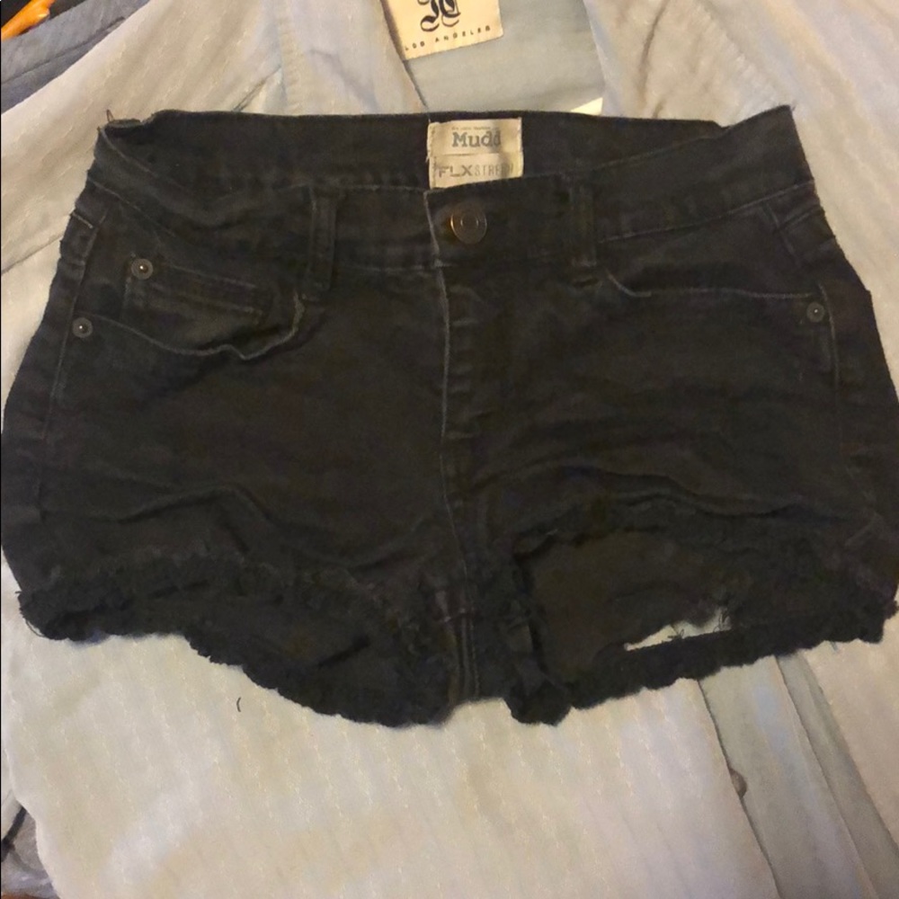 Black shorts with floral trim
